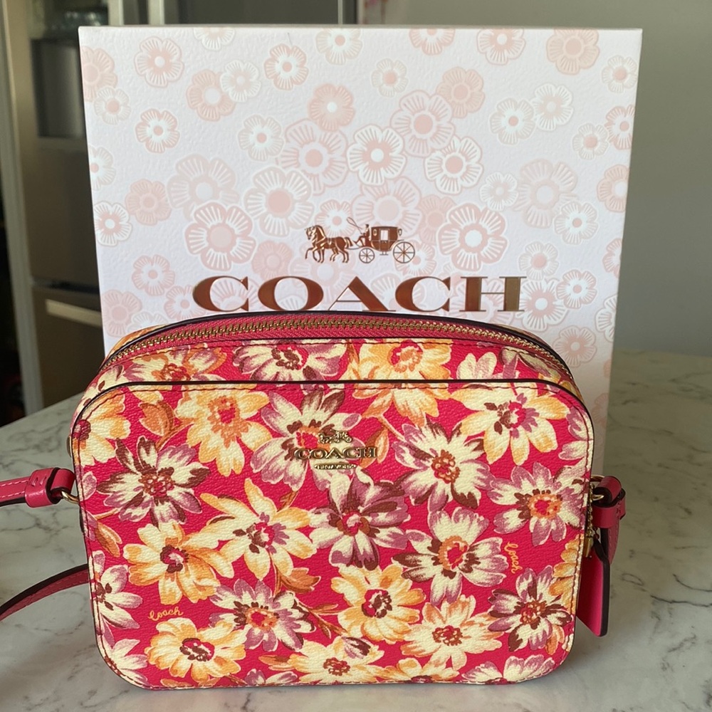 EUC Coach foral crossbody.  No call outs; in like new condition. Gorgeous bag.